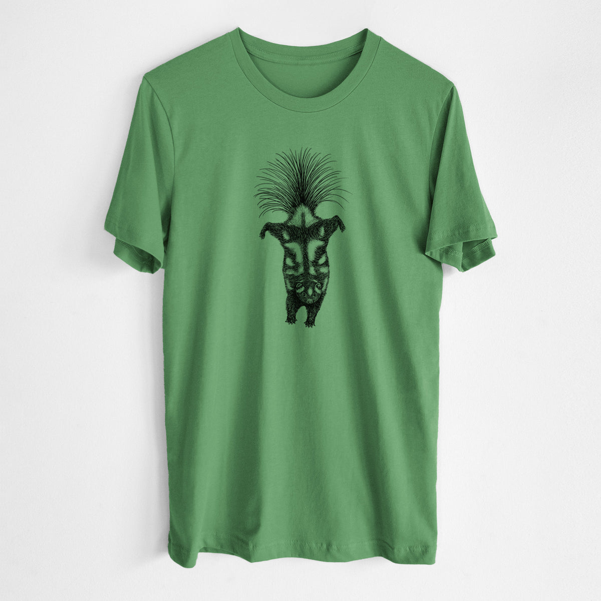 Leaf green lightweight cotton t-shirt laid flat, printed with a black ink illustration of a spotted skunk doing a handstand with its tail fanned.