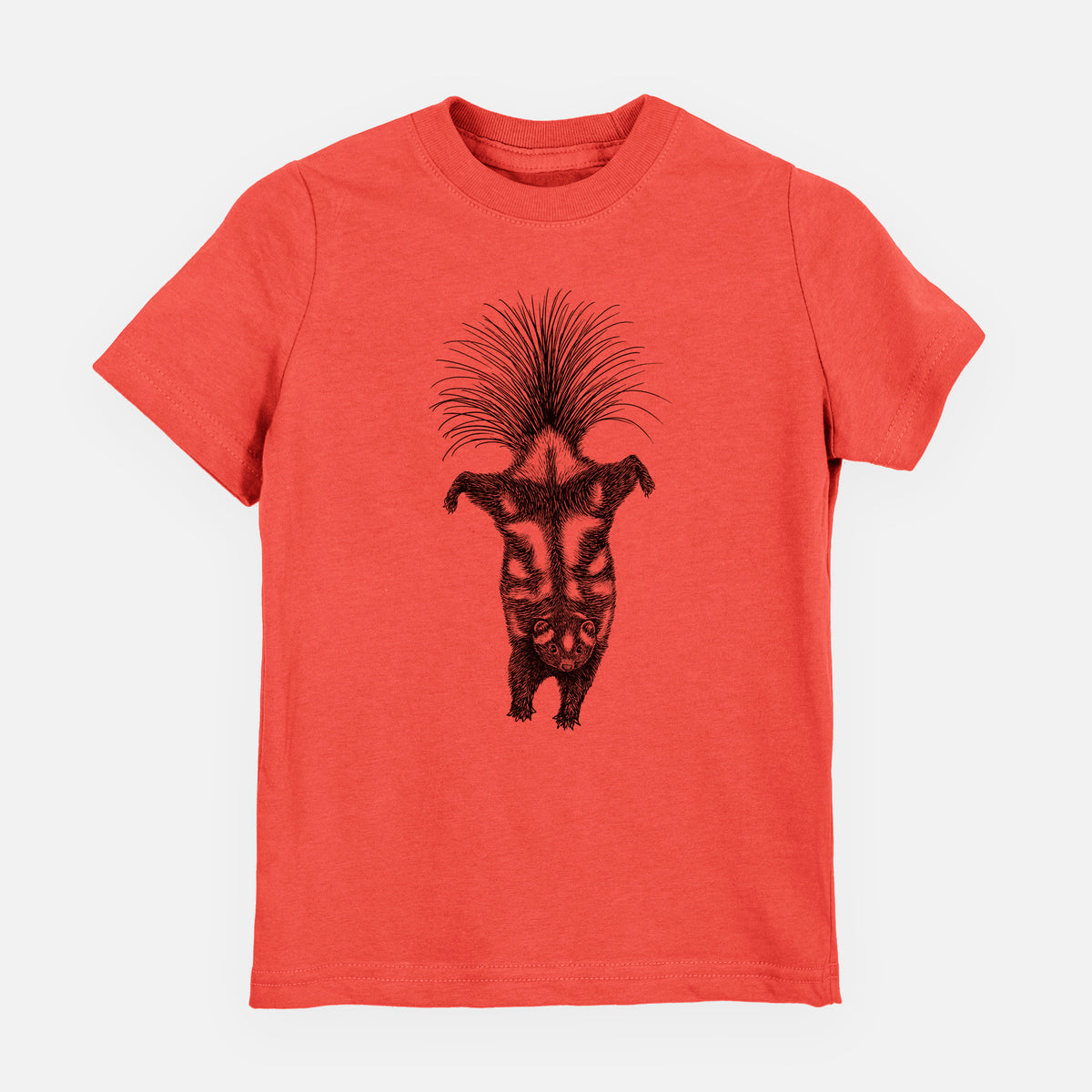 Passionfruit pink youth t-shirt laid flat, printed with a black ink illustration of a spotted skunk doing a handstand with its tail fanned.