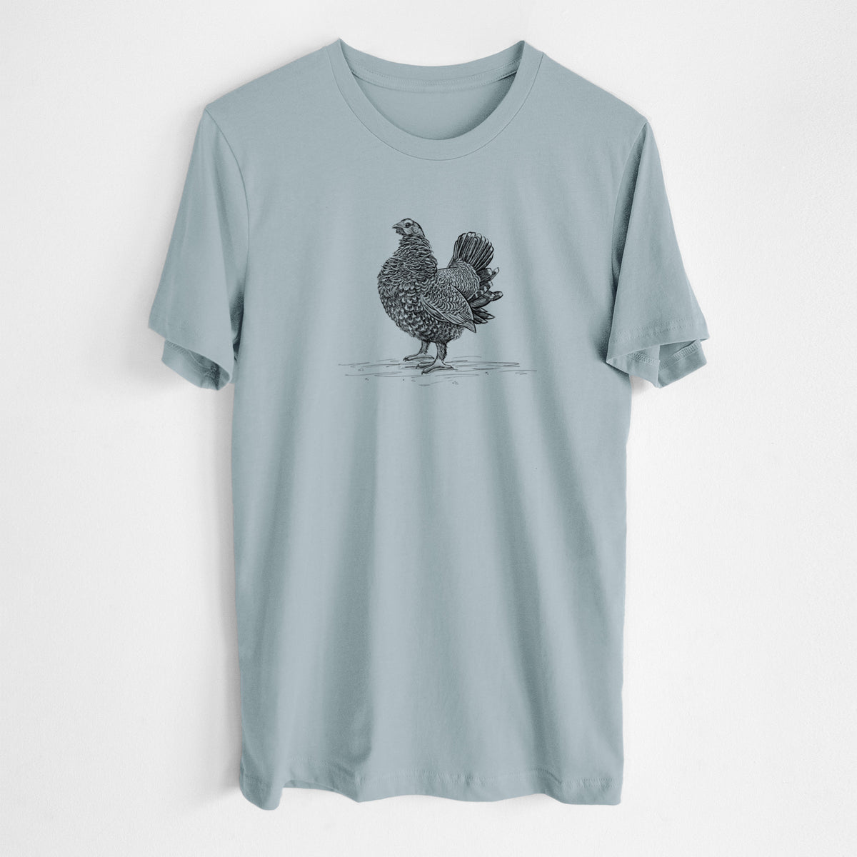 Vintage denim lightweight cotton t-shirt laid flat, printed with a detailed black ink illustration of a spruce grouse standing with its tail fanned.
