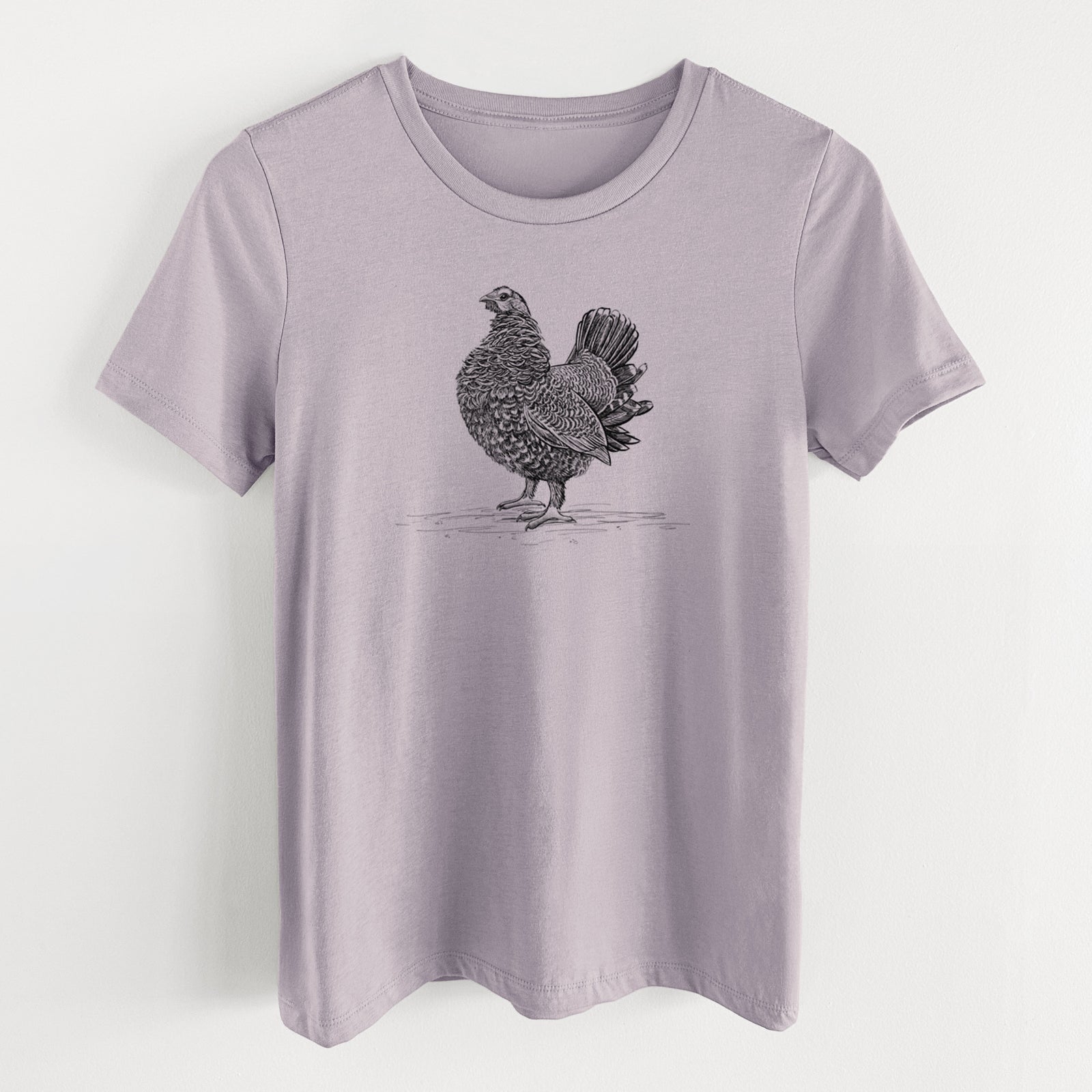 Light violet women's relaxed fit cotton t-shirt laid flat, printed with a detailed black ink illustration of a spruce grouse standing with its tail fanned.