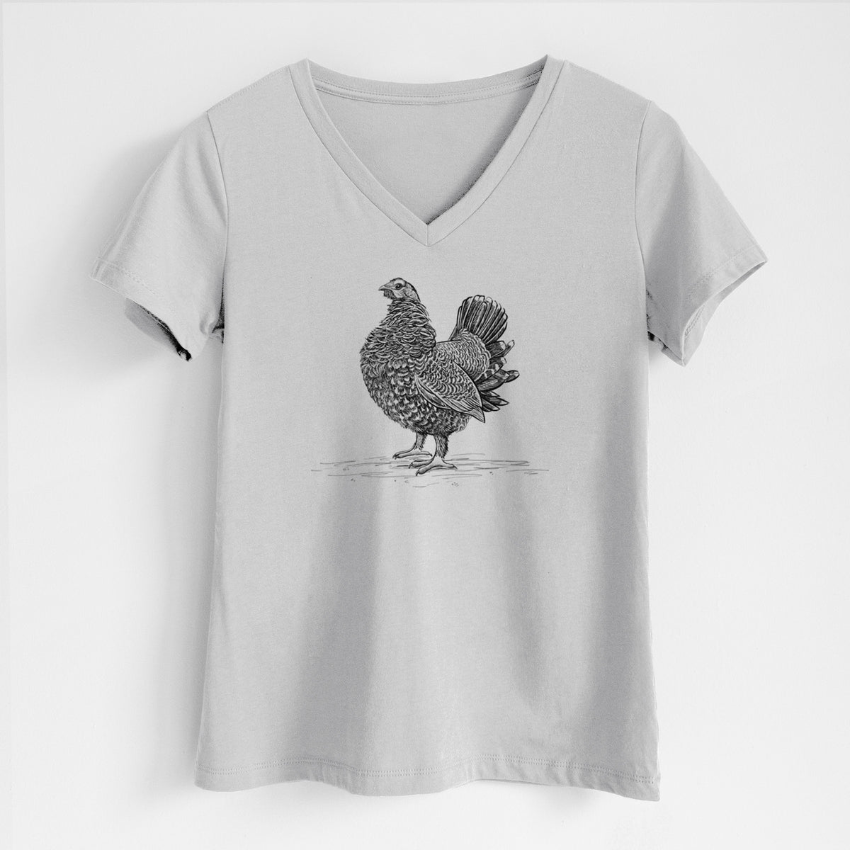 Lunar grey women's relaxed fit cotton V-neck t-shirt laid flat, printed with a detailed black ink illustration of a spruce grouse standing with its tail fanned.