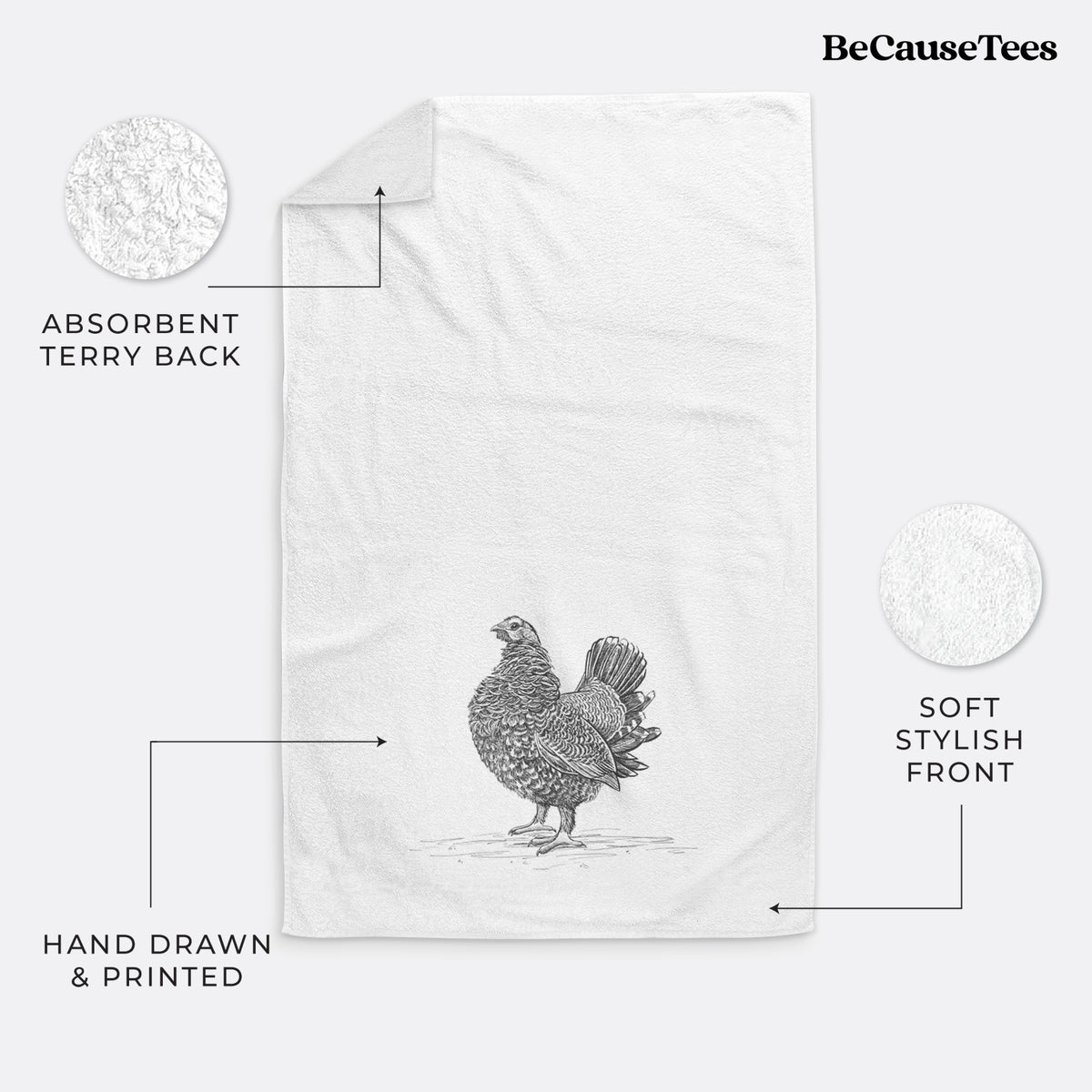 White hand towel printed with a detailed black ink illustration of a spruce grouse standing with its tail fanned.