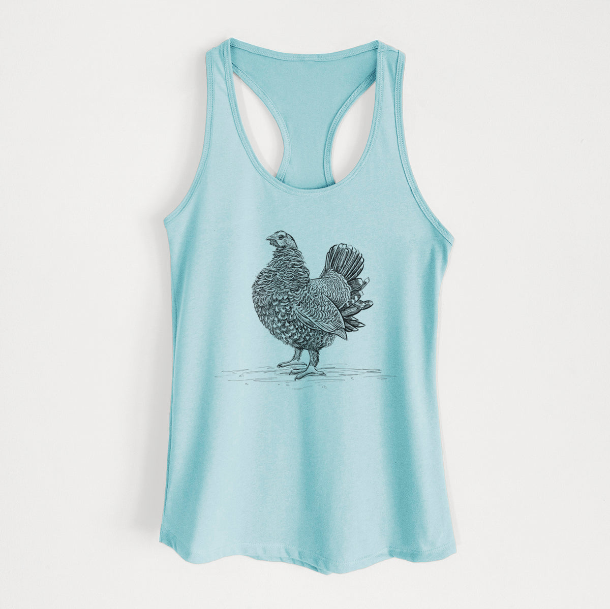 Cancun blue women's racerback tank top laid flat, printed with a detailed black ink illustration of a spruce grouse standing with its tail fanned.