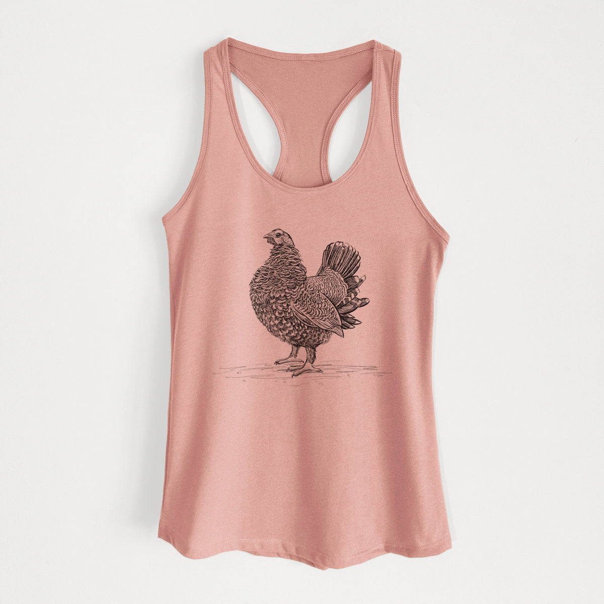 Desert pink women's racerback tank top laid flat, printed with a detailed black ink illustration of a spruce grouse standing with its tail fanned.