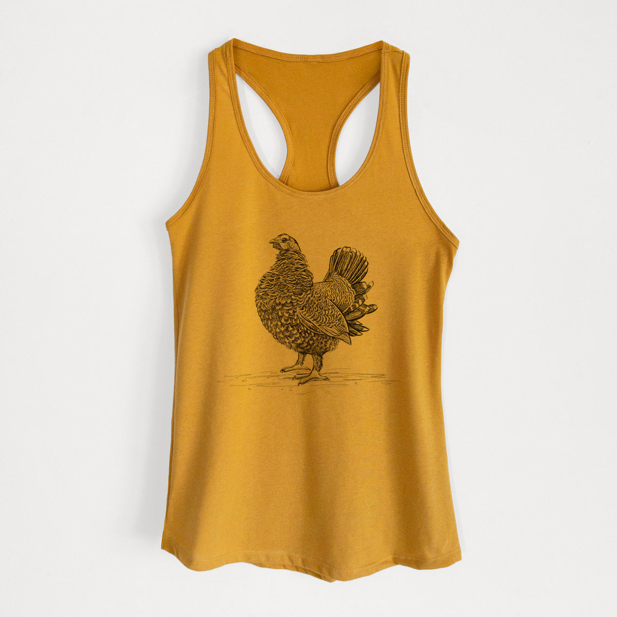Gold women's racerback tank top laid flat, printed with a detailed black ink illustration of a spruce grouse standing with its tail fanned.