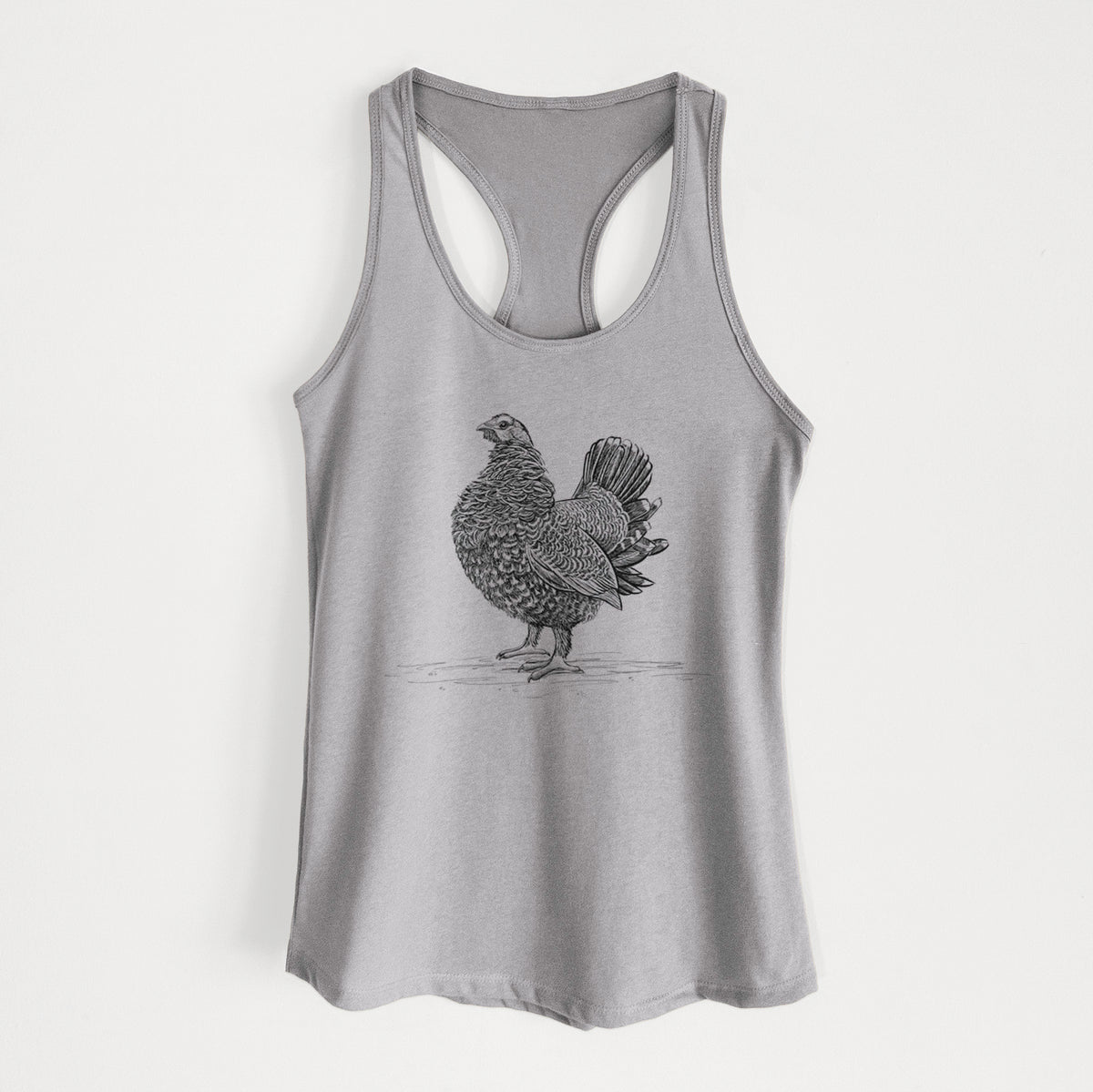 Heather grey women's racerback tank top laid flat, printed with a detailed black ink illustration of a spruce grouse standing with its tail fanned.