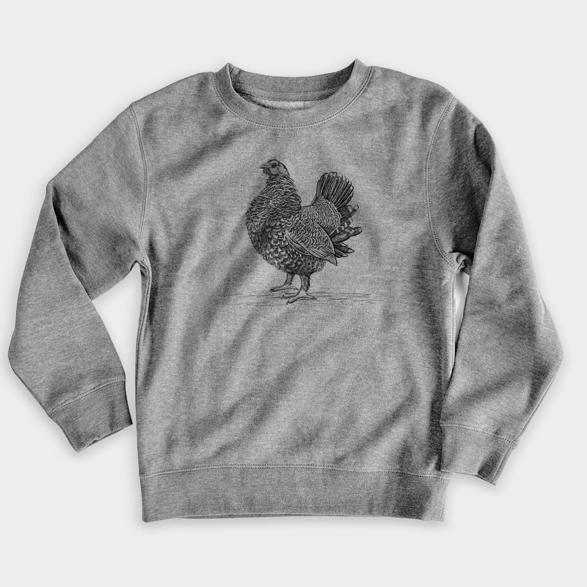Nickel grey youth crewneck sweatshirt laid flat, printed with a detailed black ink illustration of a spruce grouse standing with its tail fanned.