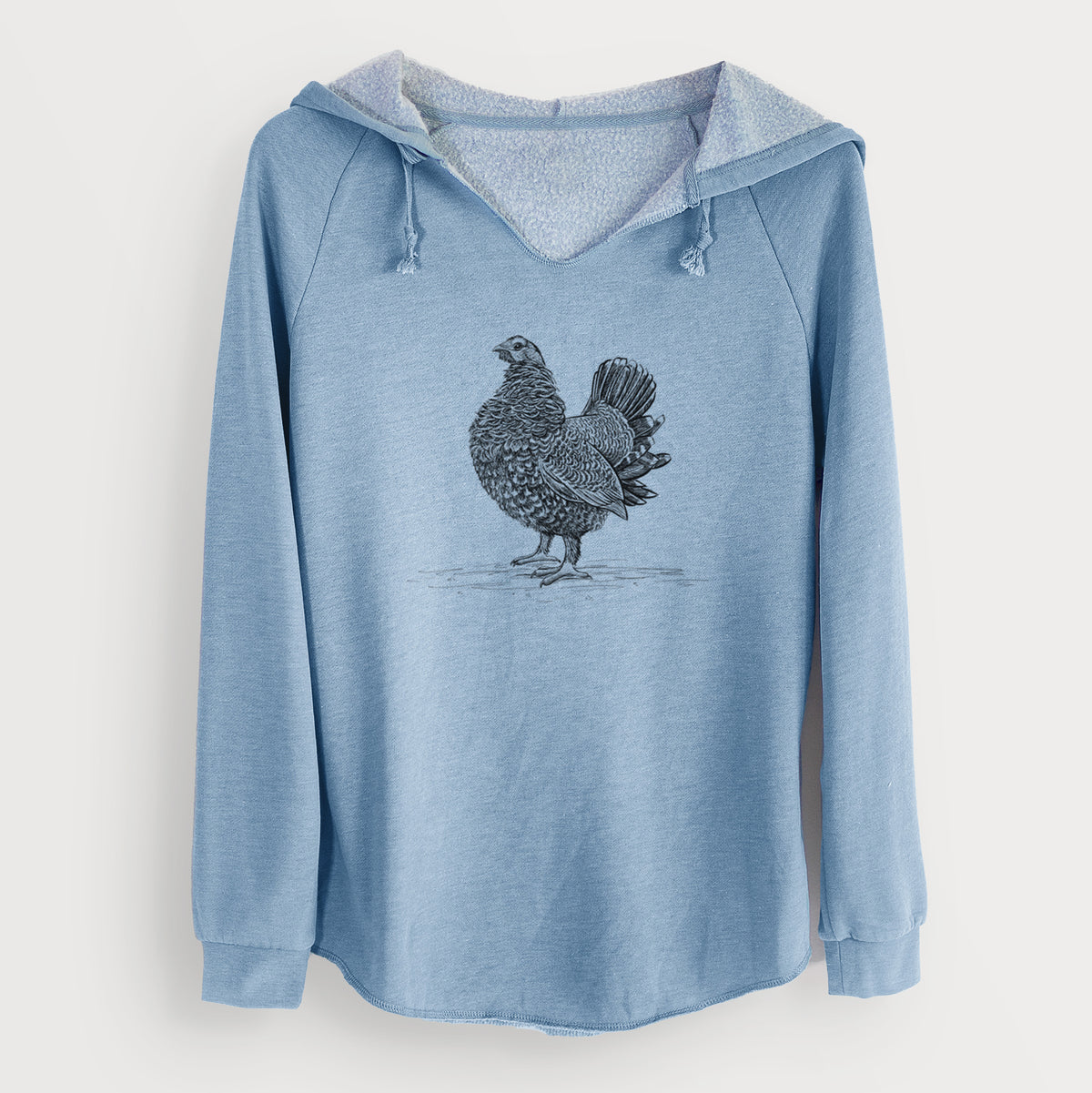 Misty blue women's Cali Wave hooded sweatshirt laid flat, printed with a detailed black ink illustration of a spruce grouse standing with its tail fanned.