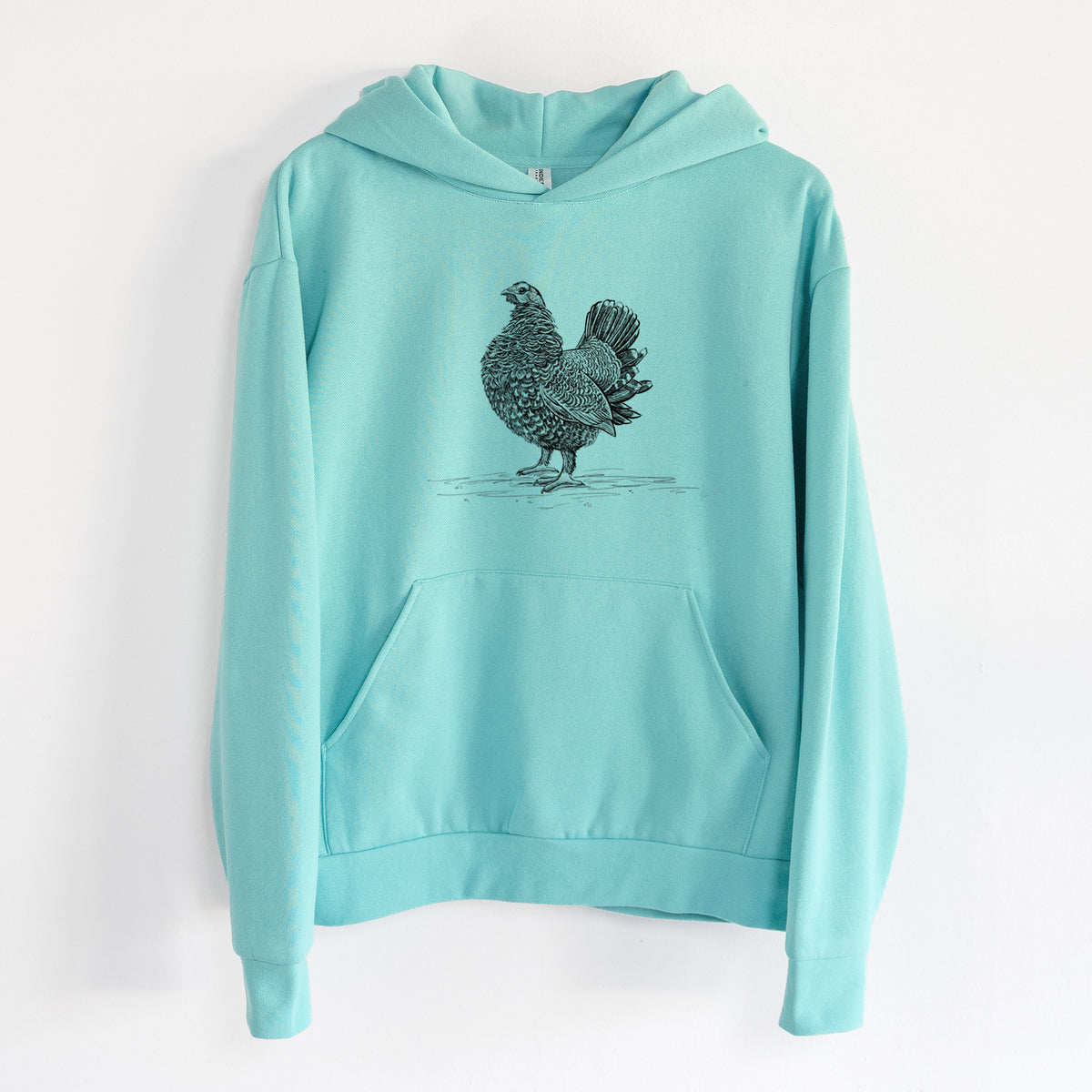 Male Spruce Grouse - Canachites canadensis - Statement Midweight Hoodie in Seafoam, hanging on a white wall, with a front kangaroo pocket and no drawcords.