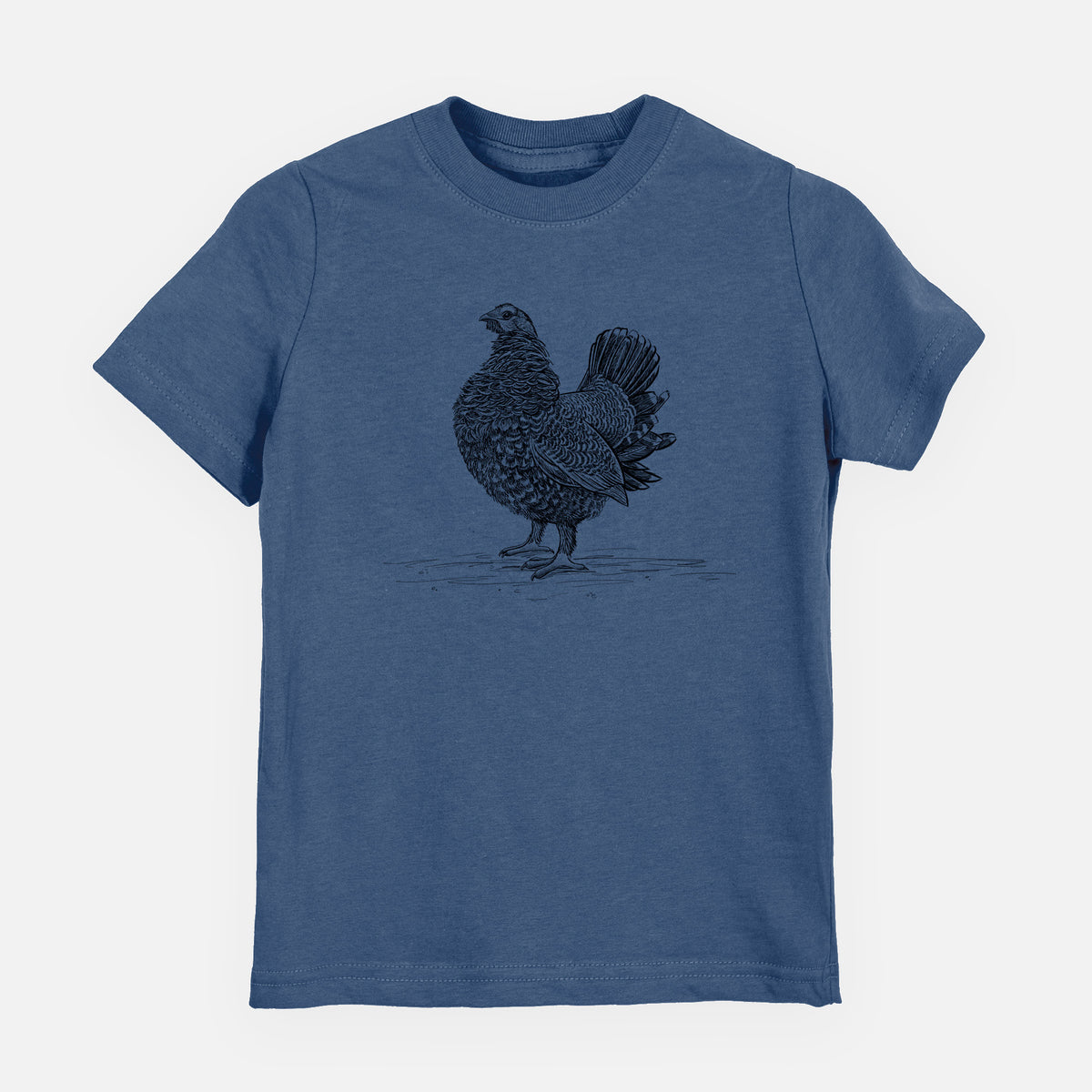 Indigo blue youth t-shirt laid flat, printed with a detailed black ink illustration of a spruce grouse standing with its tail fanned.