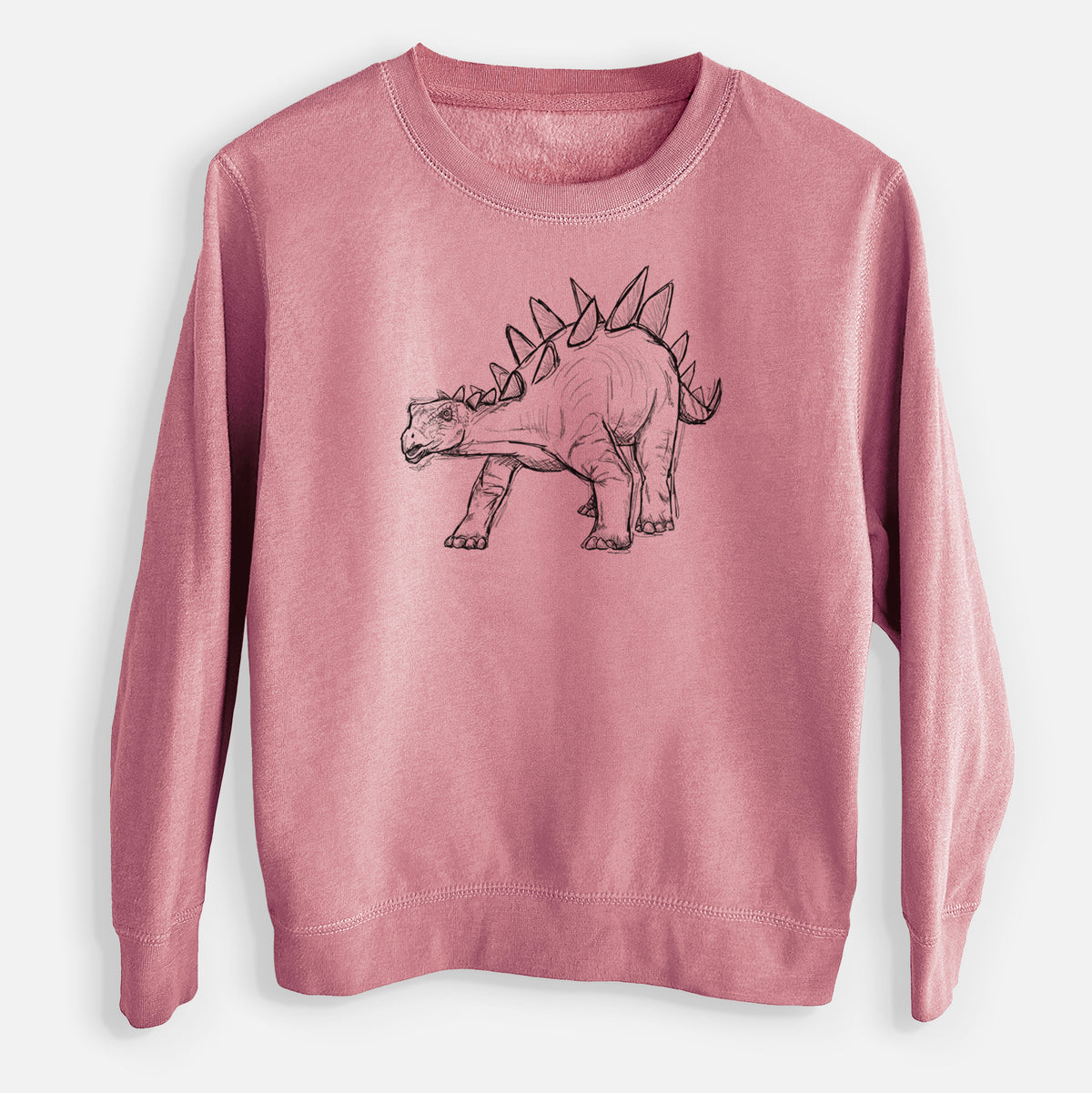 Mauve pink youth crewneck sweatshirt laid flat, printed with a black ink illustration of a Stegosaurus with plates along its back.