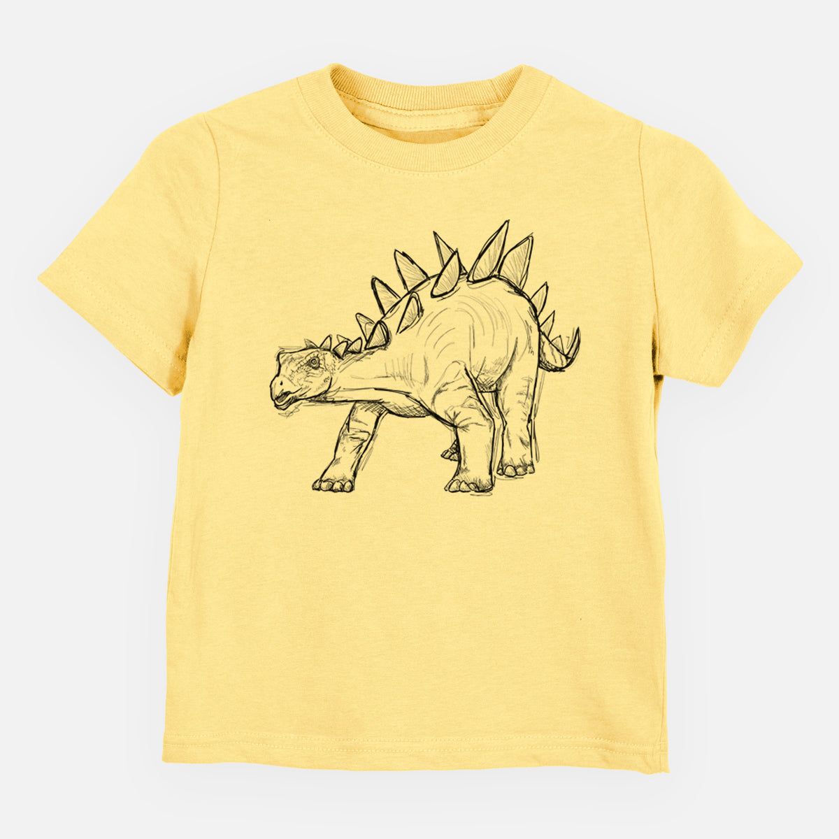 Butter yellow toddler t-shirt laid flat, printed with a black ink illustration of a Stegosaurus with plates along its back.