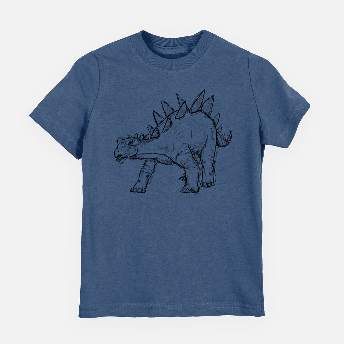 Indigo blue youth t-shirt laid flat, printed with a black ink illustration of a Stegosaurus with plates along its back.