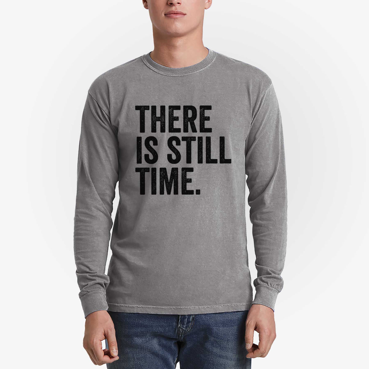Man wearing a grey Comfort Colors long sleeve shirt printed with bold black words reading There Is Still Time.