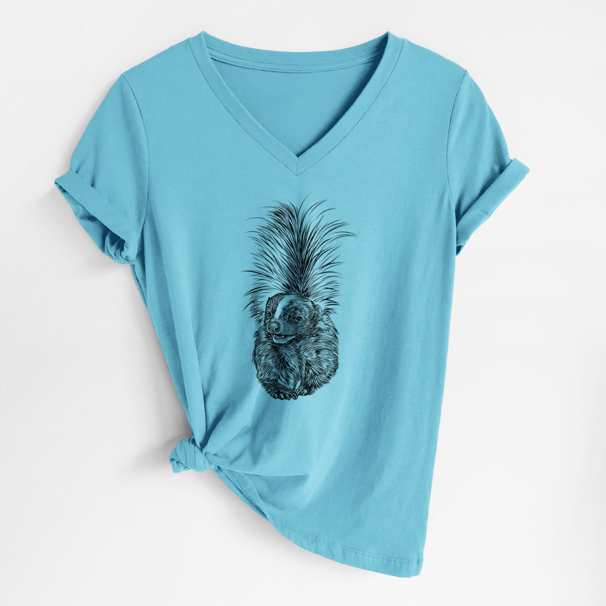 Turquoise women's relaxed fit cotton V-neck t-shirt laid flat, printed with a detailed black ink illustration of a striped skunk with its tail raised.