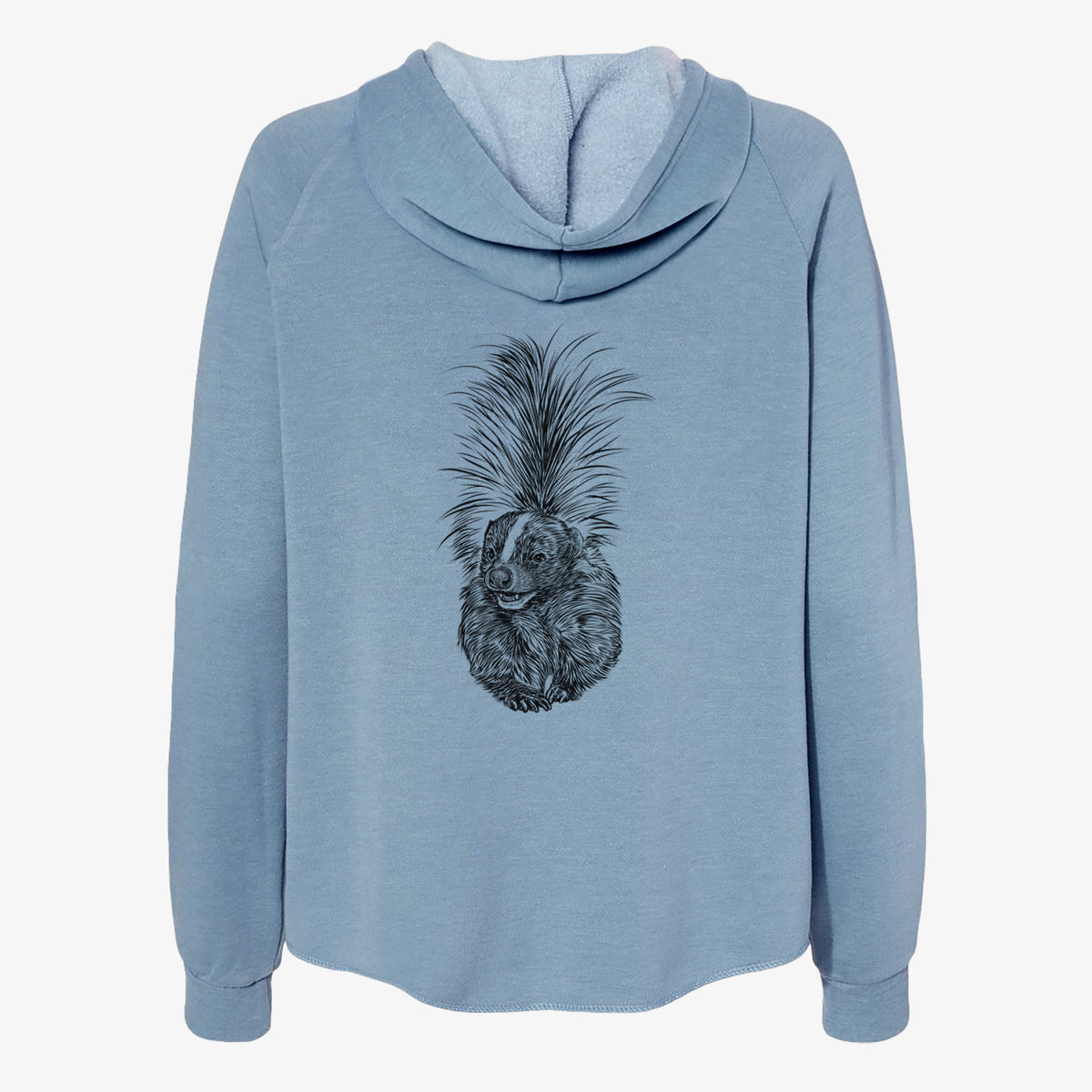 Misty blue women's Cali Wave zip-up sweatshirt laid flat, printed with a detailed black ink illustration of a striped skunk with its tail raised.