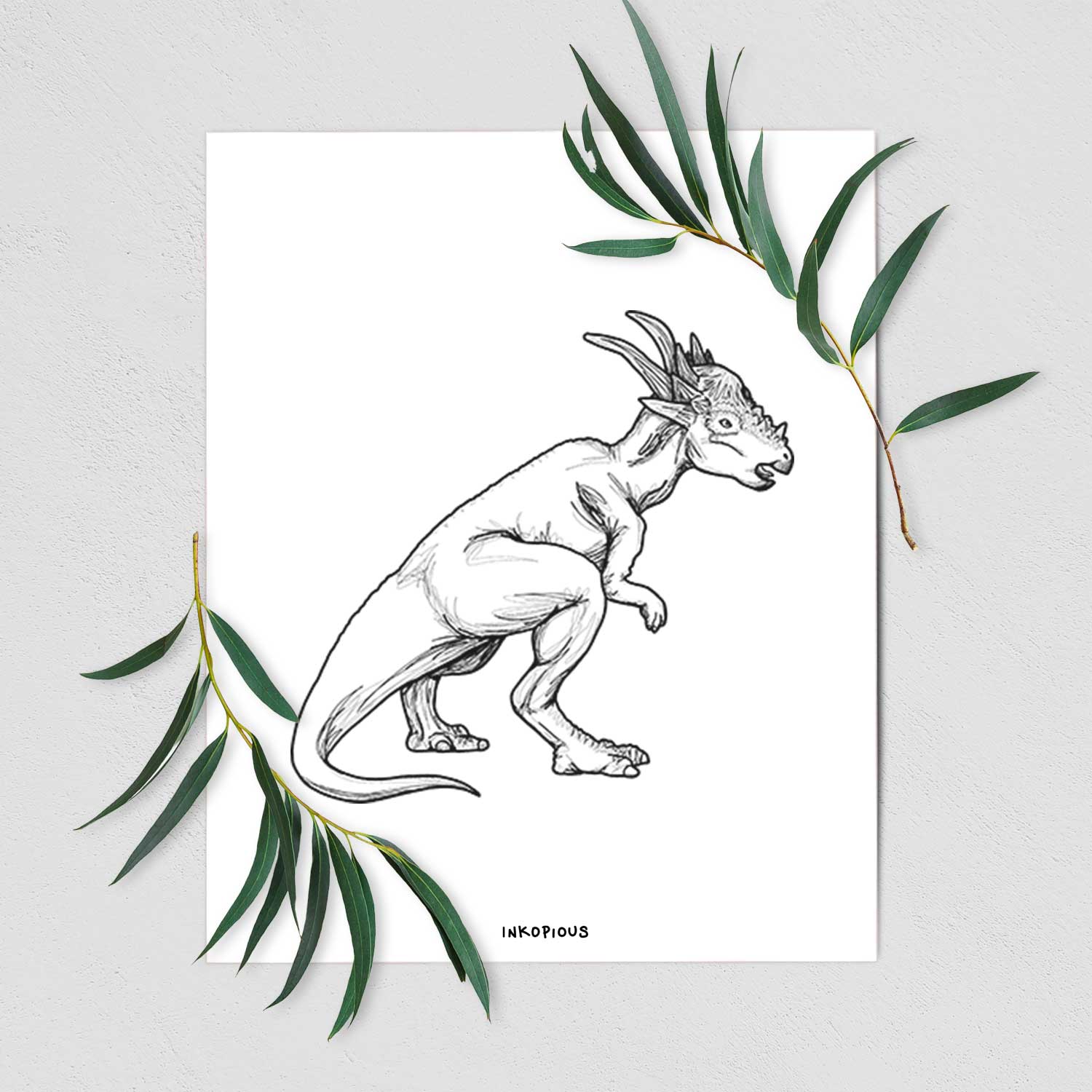 Art print of a black ink illustration of a Stygimoloch dinosaur with a spiky domed head, shown with eucalyptus leaves.