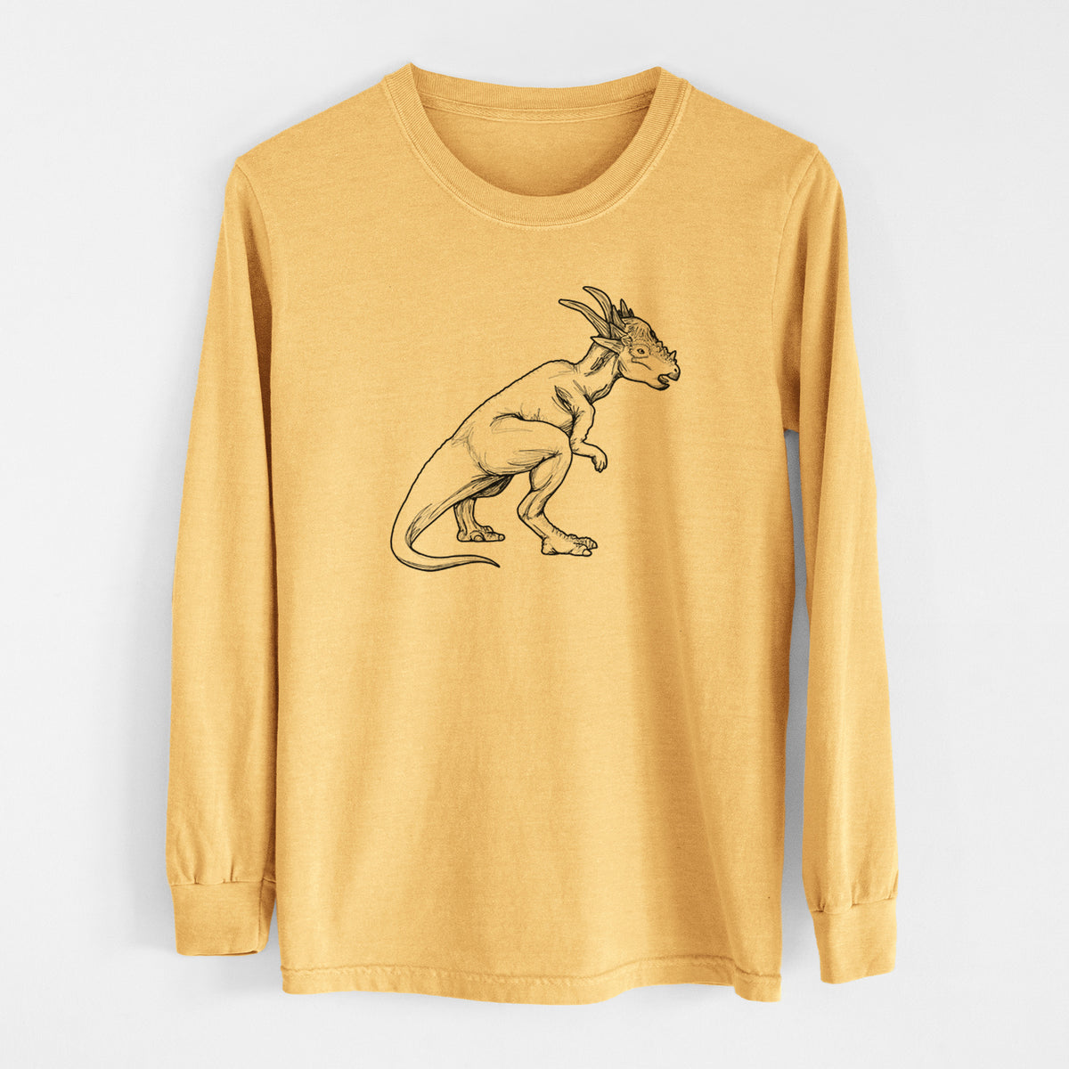 Golden wheat yellow Comfort Colors long sleeve shirt laid flat, printed with a black ink illustration of a Stygimoloch dinosaur with a spiky domed head.