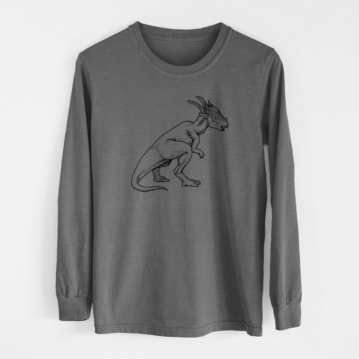 Pepper Comfort Colors long sleeve shirt laid flat, printed with a black ink illustration of a Stygimoloch dinosaur with a spiky domed head.