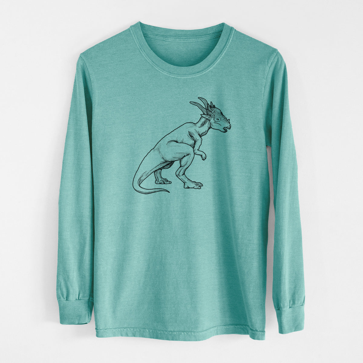 Reef green Comfort Colors long sleeve shirt laid flat, printed with a black ink illustration of a Stygimoloch dinosaur with a spiky domed head.