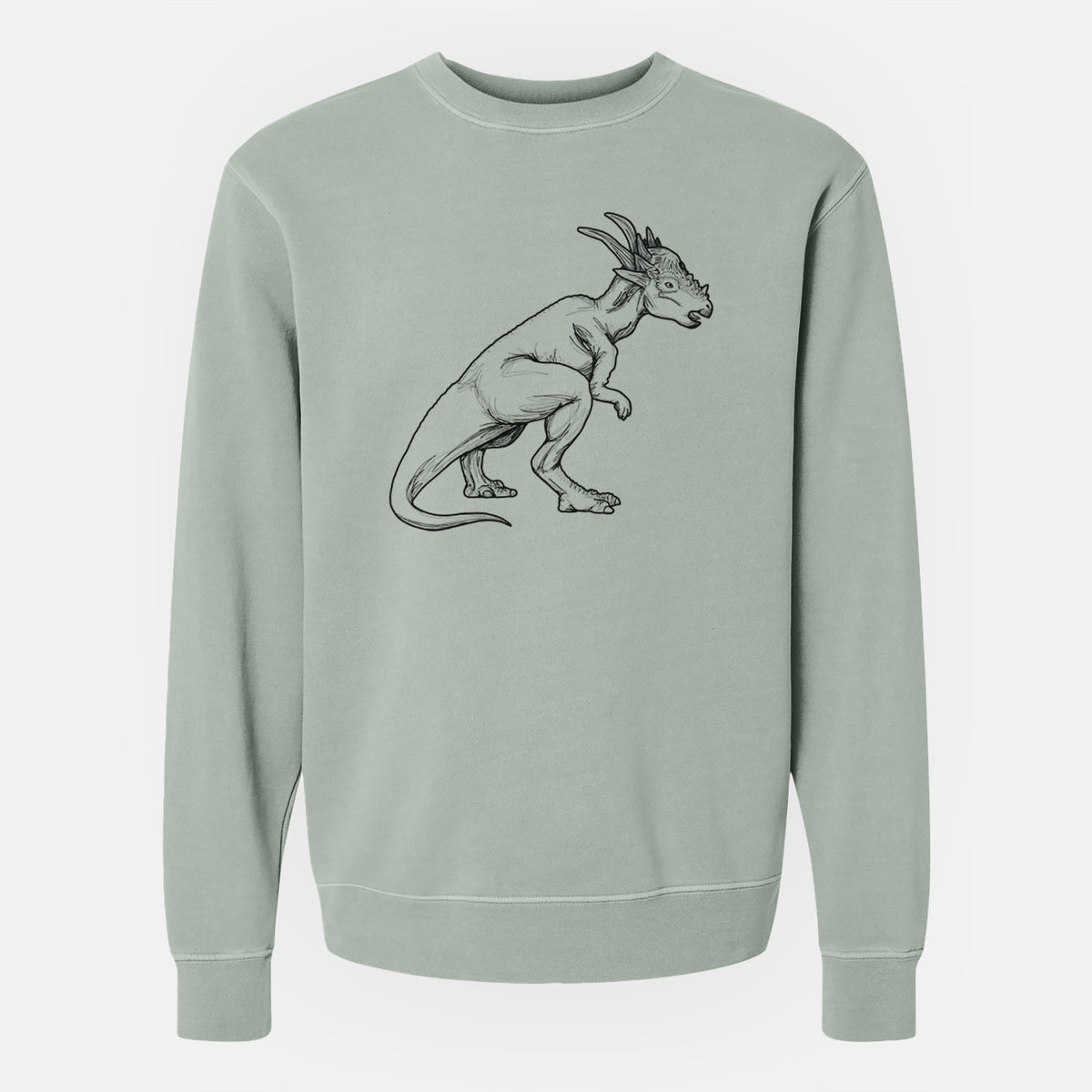 Sage green pigment dyed crewneck sweatshirt laid flat, printed with a black ink illustration of a Stygimoloch dinosaur with a spiky domed head.