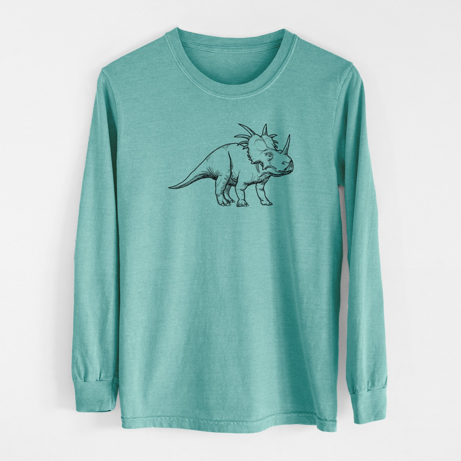 Reef green Comfort Colors long sleeve shirt laid flat, printed with a black ink illustration of a Styracosaurus with its spiked frill.