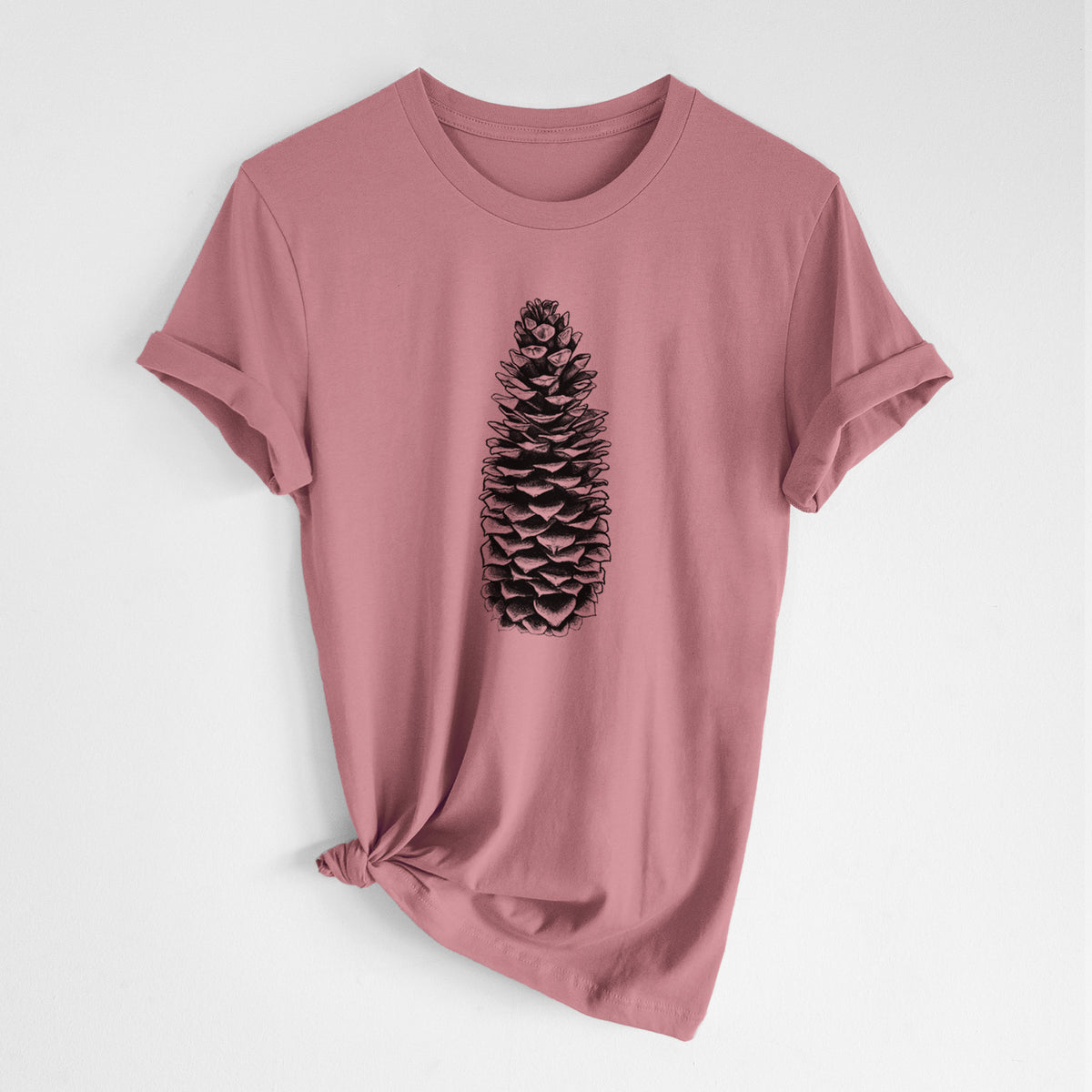 Mauve pink lightweight cotton t-shirt laid flat with the sleeves rolled, printed with a detailed black ink illustration of a long sugar pine cone.