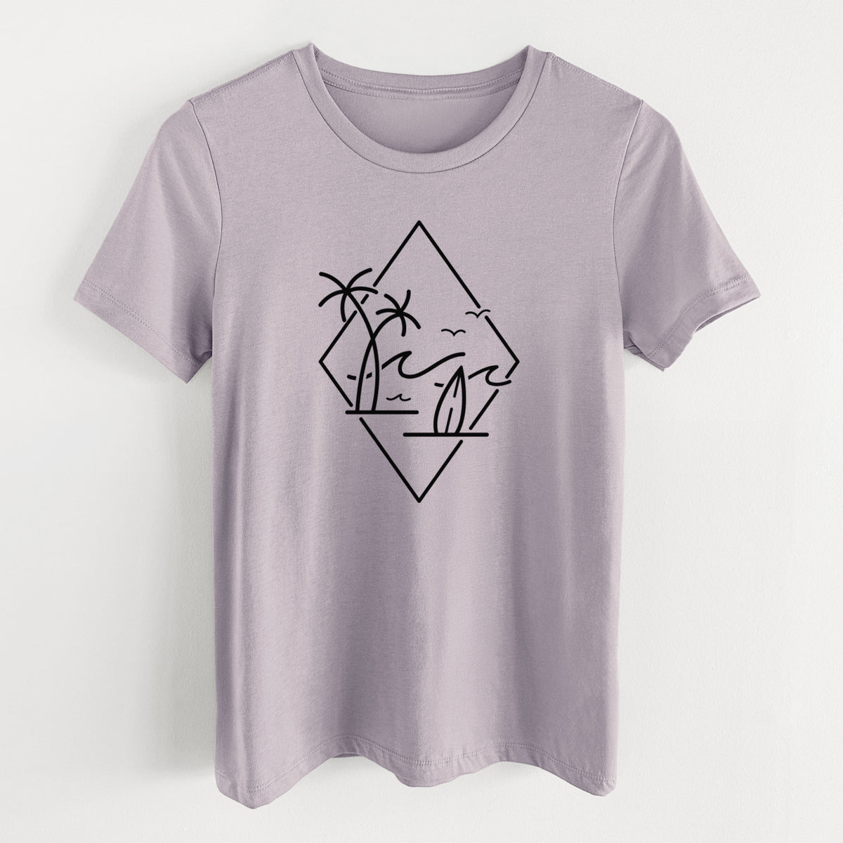 Light violet women's relaxed fit cotton t-shirt laid flat, printed with black line art of palm trees, ocean waves, birds and a surfboard inside a diamond outline.