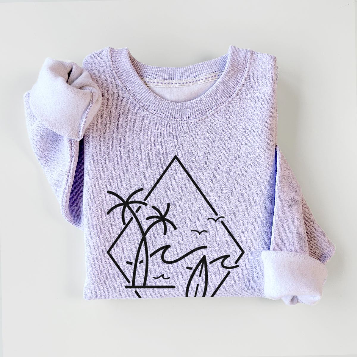Ice purple knit sweatshirt printed with black line art of palm trees, ocean waves, birds and a surfboard inside a diamond outline, styled flat.