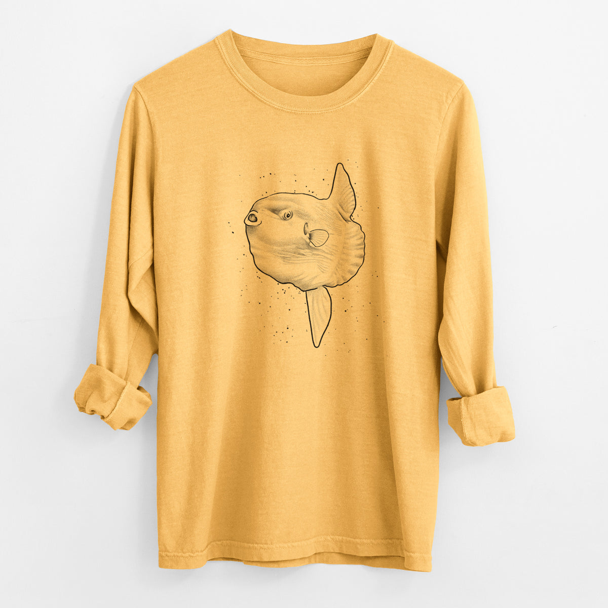 Golden wheat yellow Comfort Colors long sleeve shirt laid flat with the cuffs rolled, printed with a black ink illustration of an ocean sunfish swimming.
