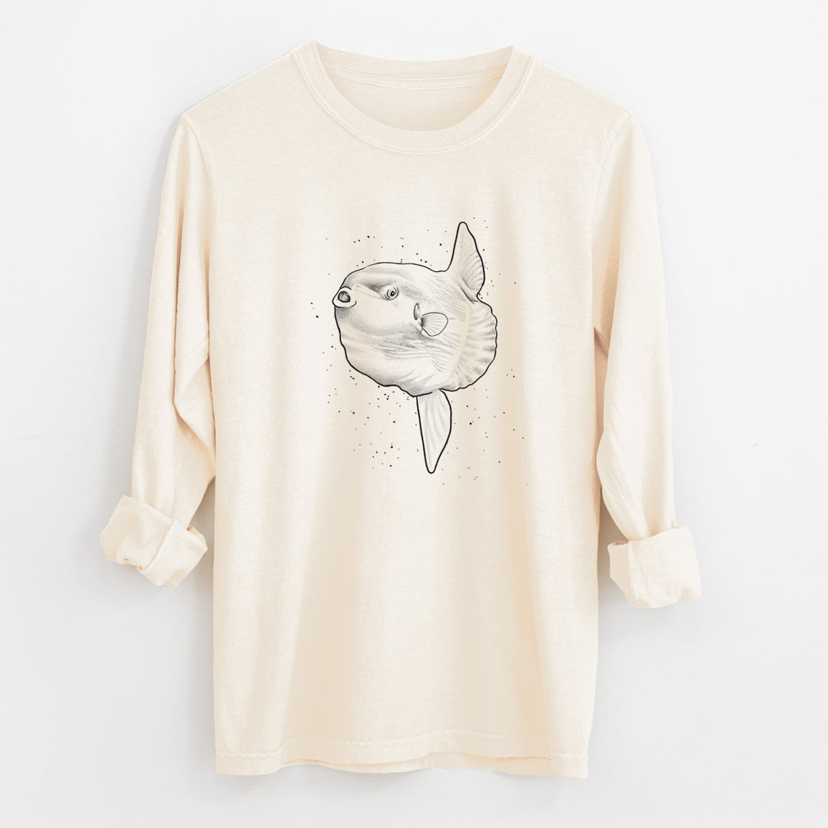 Ivory Comfort Colors long sleeve shirt laid flat with the cuffs rolled, printed with a black ink illustration of an ocean sunfish swimming.