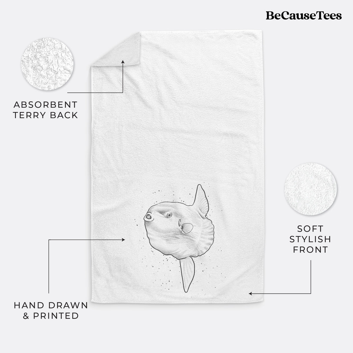 White hand towel printed with a black ink illustration of an ocean sunfish swimming.