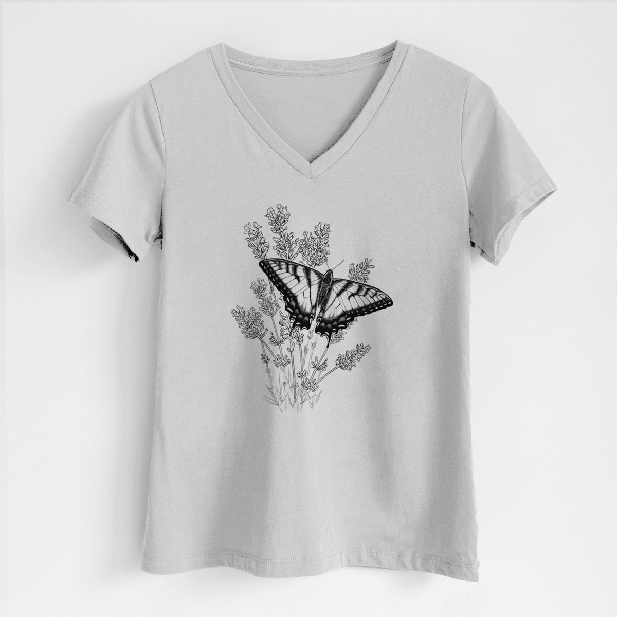 Lunar grey women's relaxed fit cotton V-neck t-shirt laid flat, printed with a black ink illustration of a swallowtail butterfly resting on lavender.