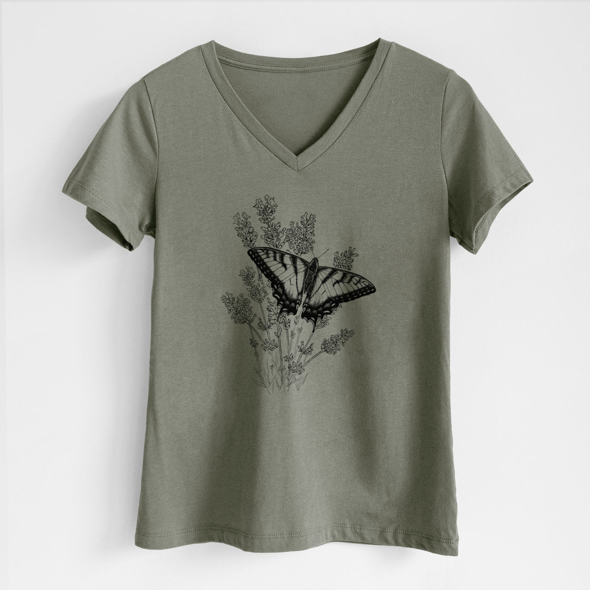 Military green women's relaxed fit cotton V-neck t-shirt laid flat, printed with a black ink illustration of a swallowtail butterfly resting on lavender.