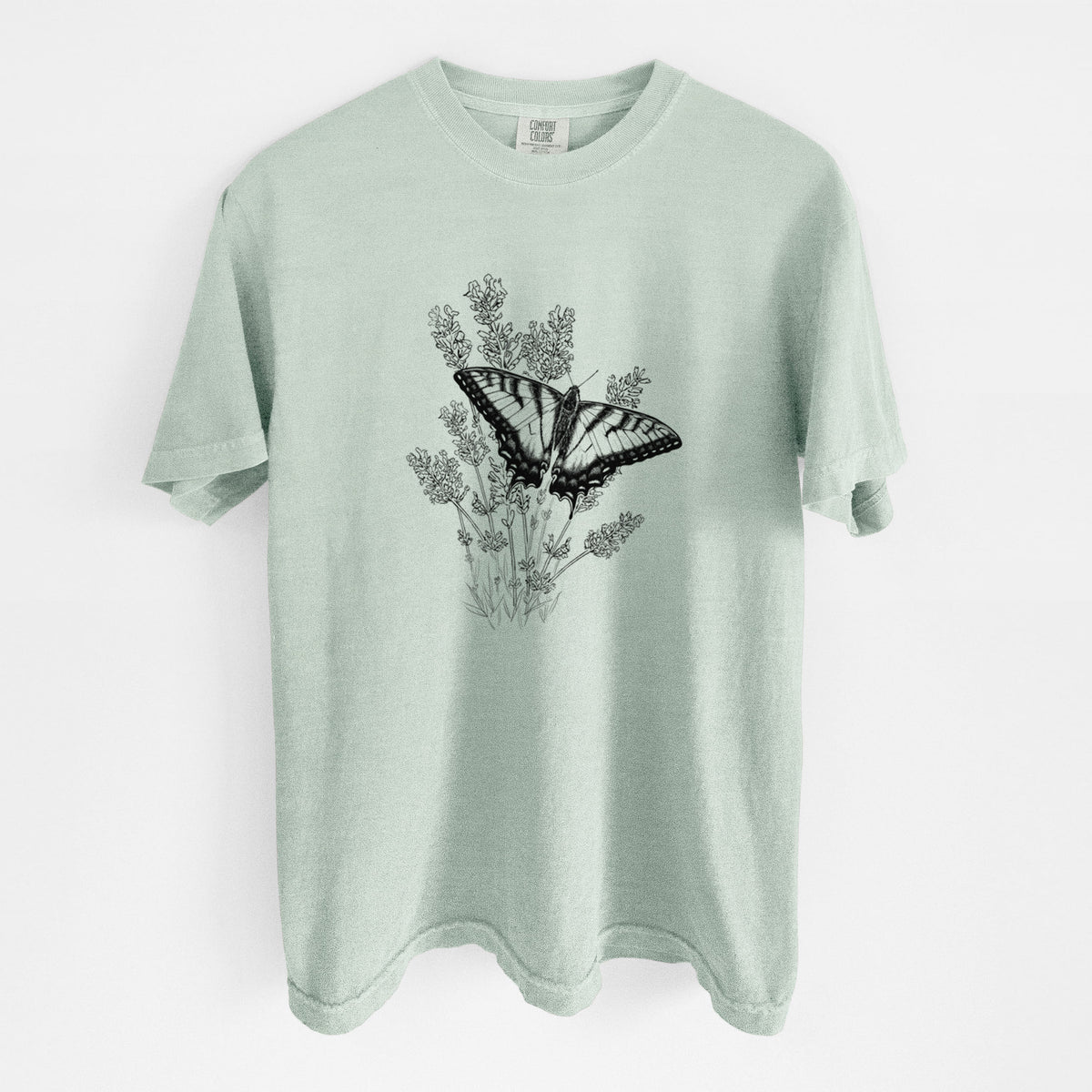 Bay green Comfort Colors t-shirt laid flat, printed with a black ink illustration of a swallowtail butterfly resting on lavender.