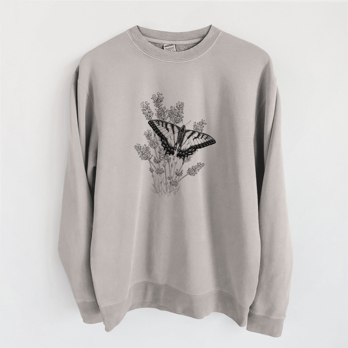 Cement grey pigment dyed crewneck sweatshirt laid flat, printed with a black ink illustration of a swallowtail butterfly resting on lavender.