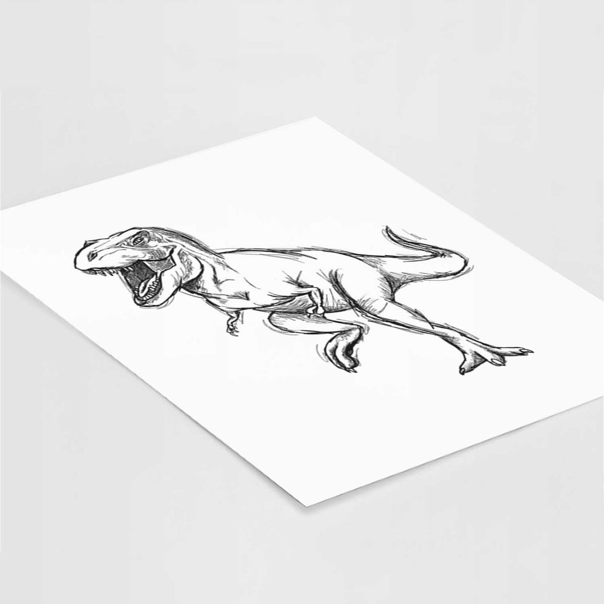 Art print of a black ink illustration of a Tyrannosaurus rex roaring, lying at an angle on a white surface.