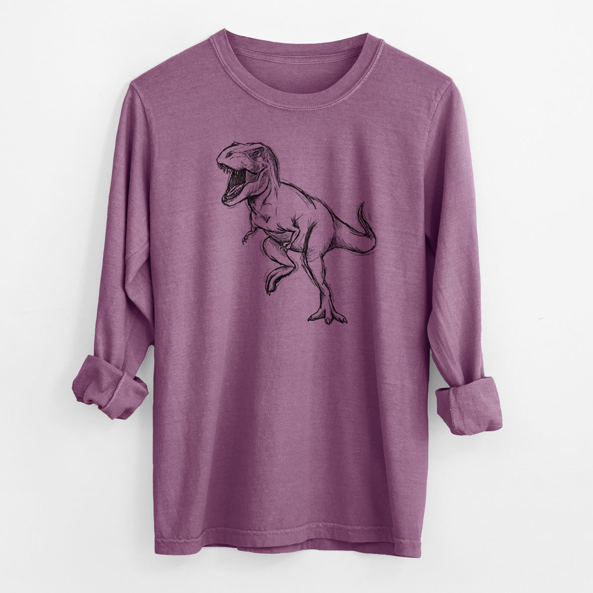Berry pink Comfort Colors long sleeve shirt laid flat with the cuffs rolled, printed with a black ink illustration of a Tyrannosaurus rex roaring.
