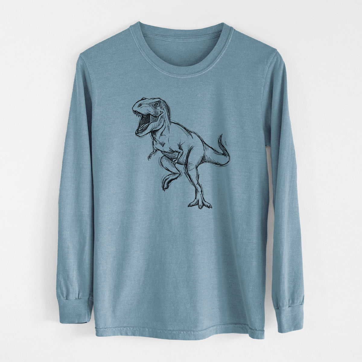 Steel blue Comfort Colors long sleeve shirt laid flat, printed with a black ink illustration of a Tyrannosaurus rex roaring.