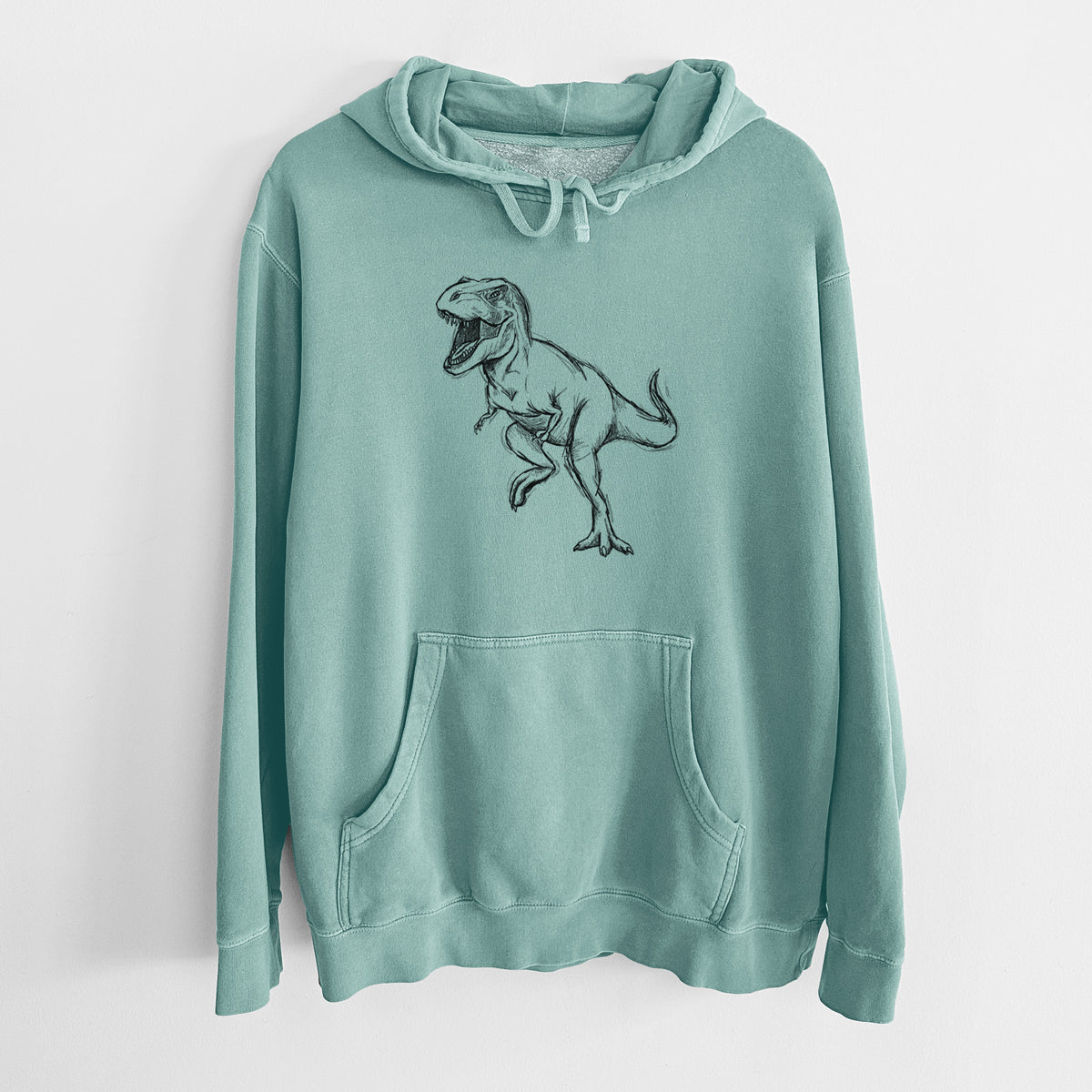 Mint green pigment dyed hoodie laid flat, printed with a black ink illustration of a Tyrannosaurus rex roaring.