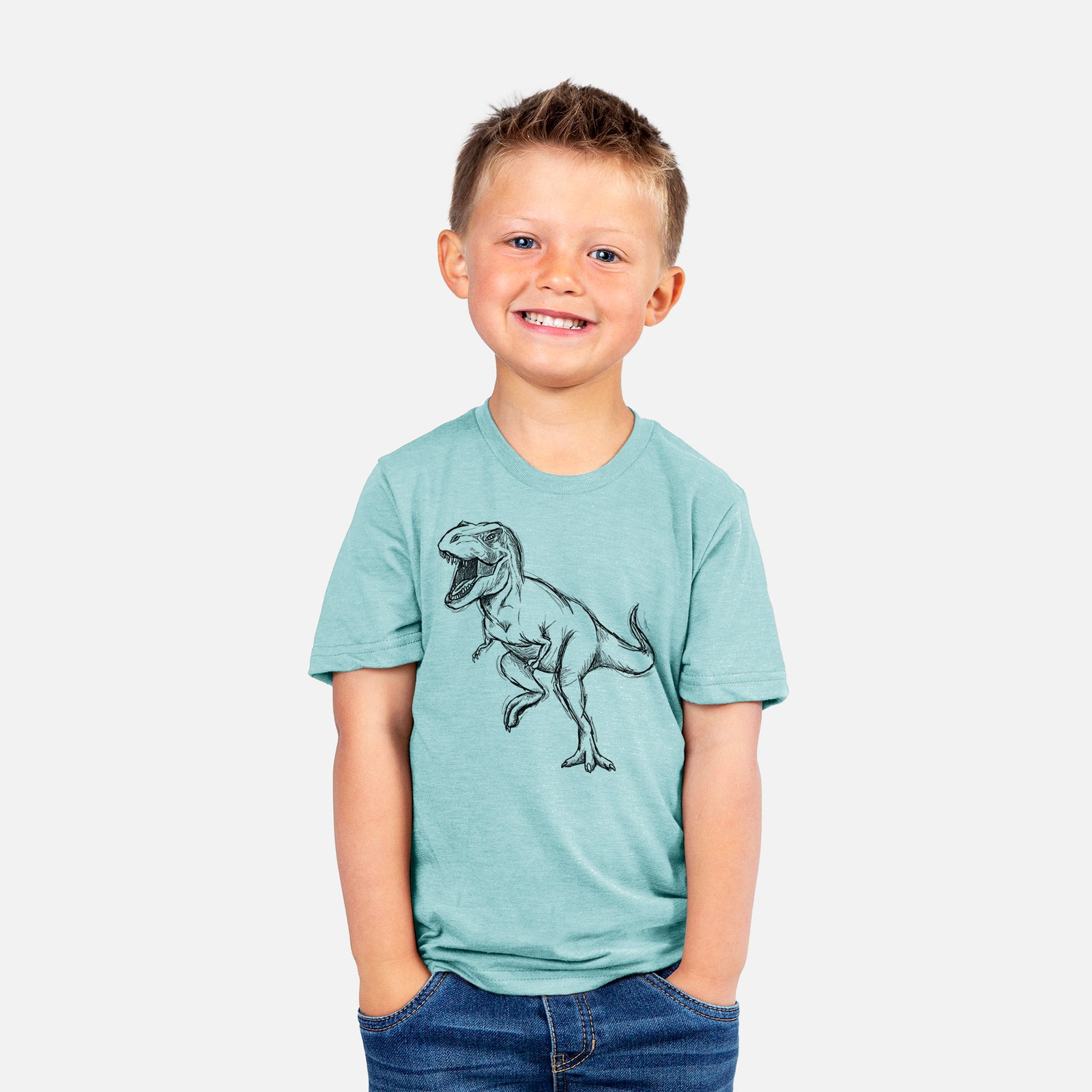 Two youth t-shirts in different colors on hangers, printed with a black ink illustration of a Tyrannosaurus rex roaring.