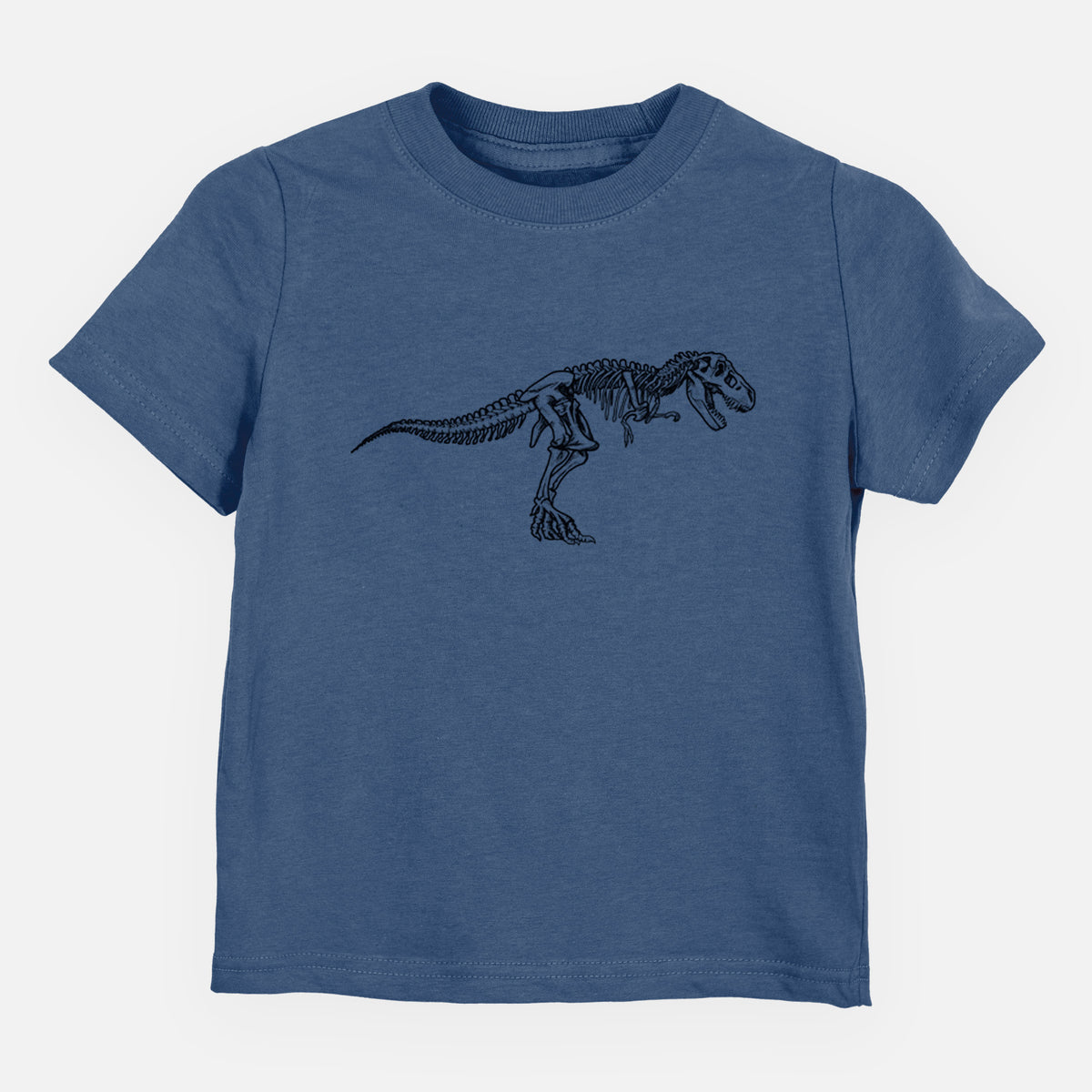 Indigo blue toddler t-shirt laid flat, printed with a black ink illustration of a Tyrannosaurus rex skeleton.