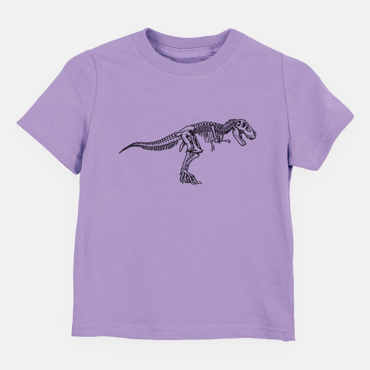 Lavender toddler t-shirt laid flat, printed with a black ink illustration of a Tyrannosaurus rex skeleton.