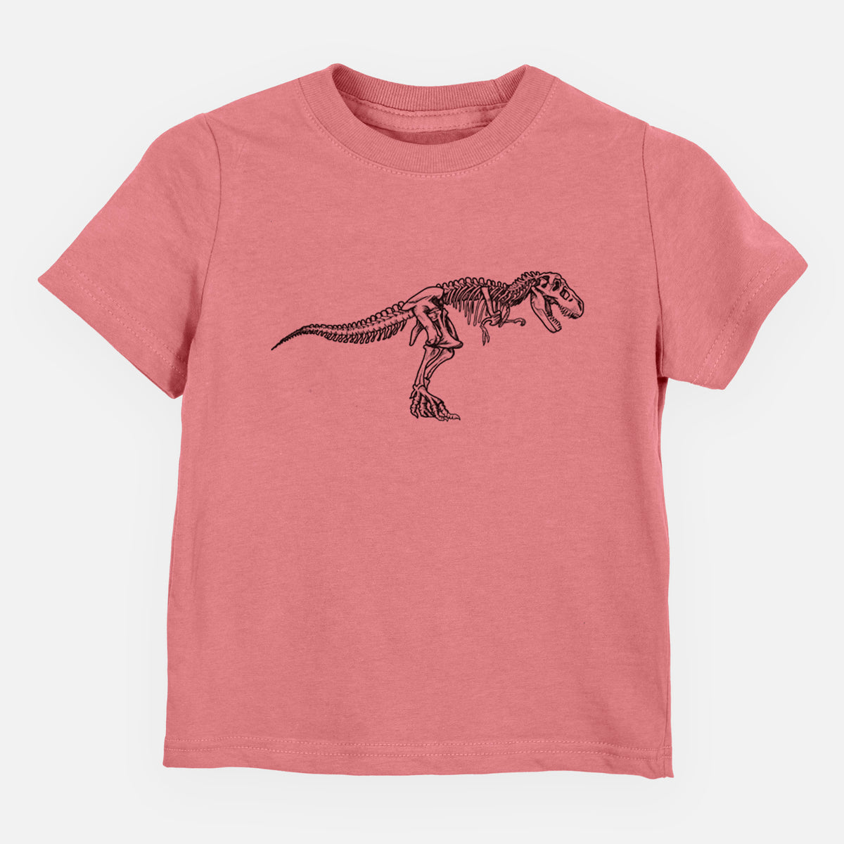 Mauve pink toddler t-shirt laid flat, printed with a black ink illustration of a Tyrannosaurus rex skeleton.