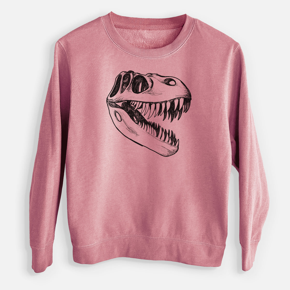 Mauve pink youth crewneck sweatshirt laid flat, printed with a black ink illustration of a Tyrannosaurus rex skull with sharp teeth.