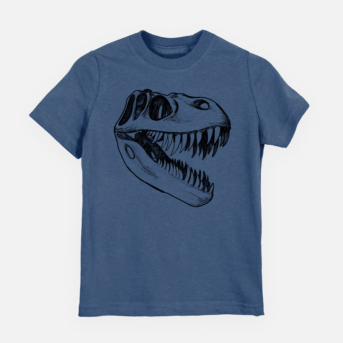 Indigo blue youth t-shirt laid flat, printed with a black ink illustration of a Tyrannosaurus rex skull with sharp teeth.