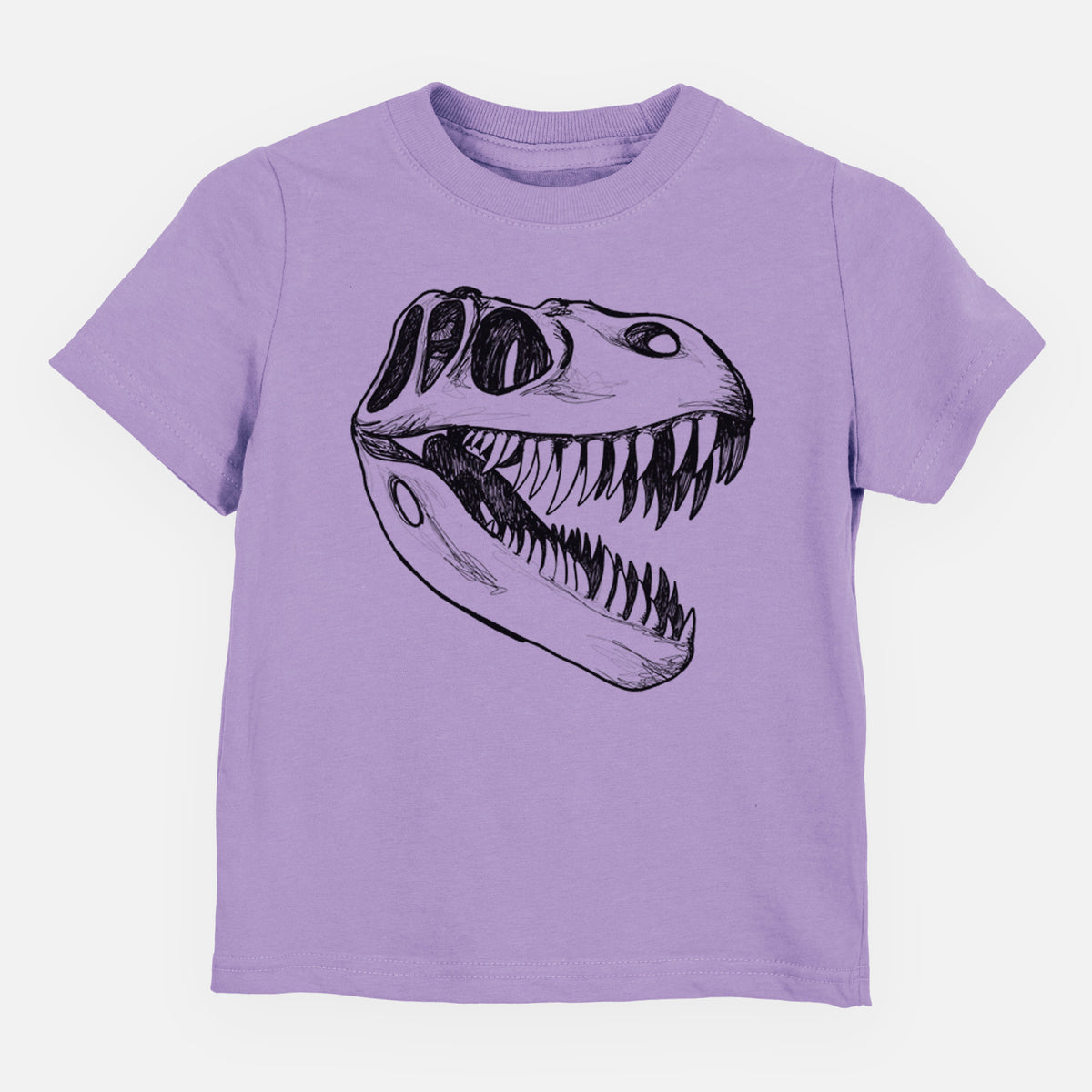 Lavender toddler t-shirt laid flat, printed with a black ink illustration of a Tyrannosaurus rex skull with sharp teeth.