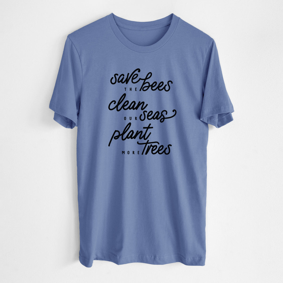 Blue bell lightweight cotton t-shirt laid flat, printed with black hand-lettered words reading Save the Bees, Clean Our Seas, Plant More Trees.