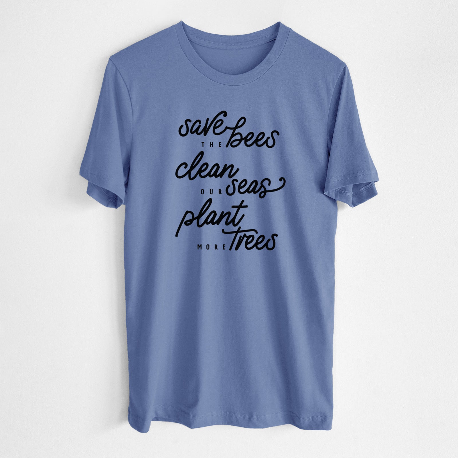Blue bell lightweight cotton t-shirt laid flat, printed with black hand-lettered words reading Save the Bees, Clean Our Seas, Plant More Trees.