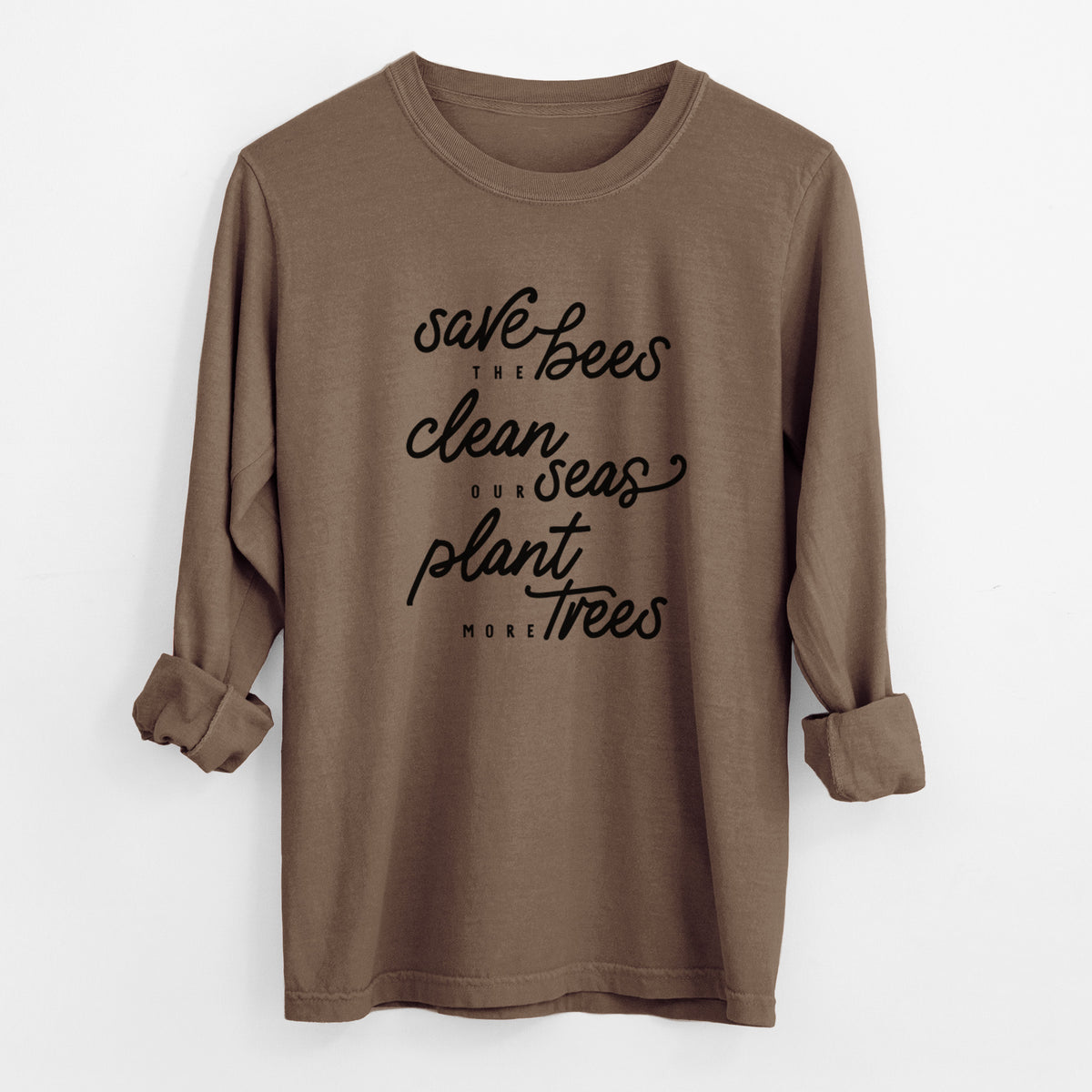Espresso brown Comfort Colors long sleeve shirt laid flat with the cuffs rolled, printed with black hand-lettered words reading Save the Bees, Clean Our Seas, Plant More Trees.